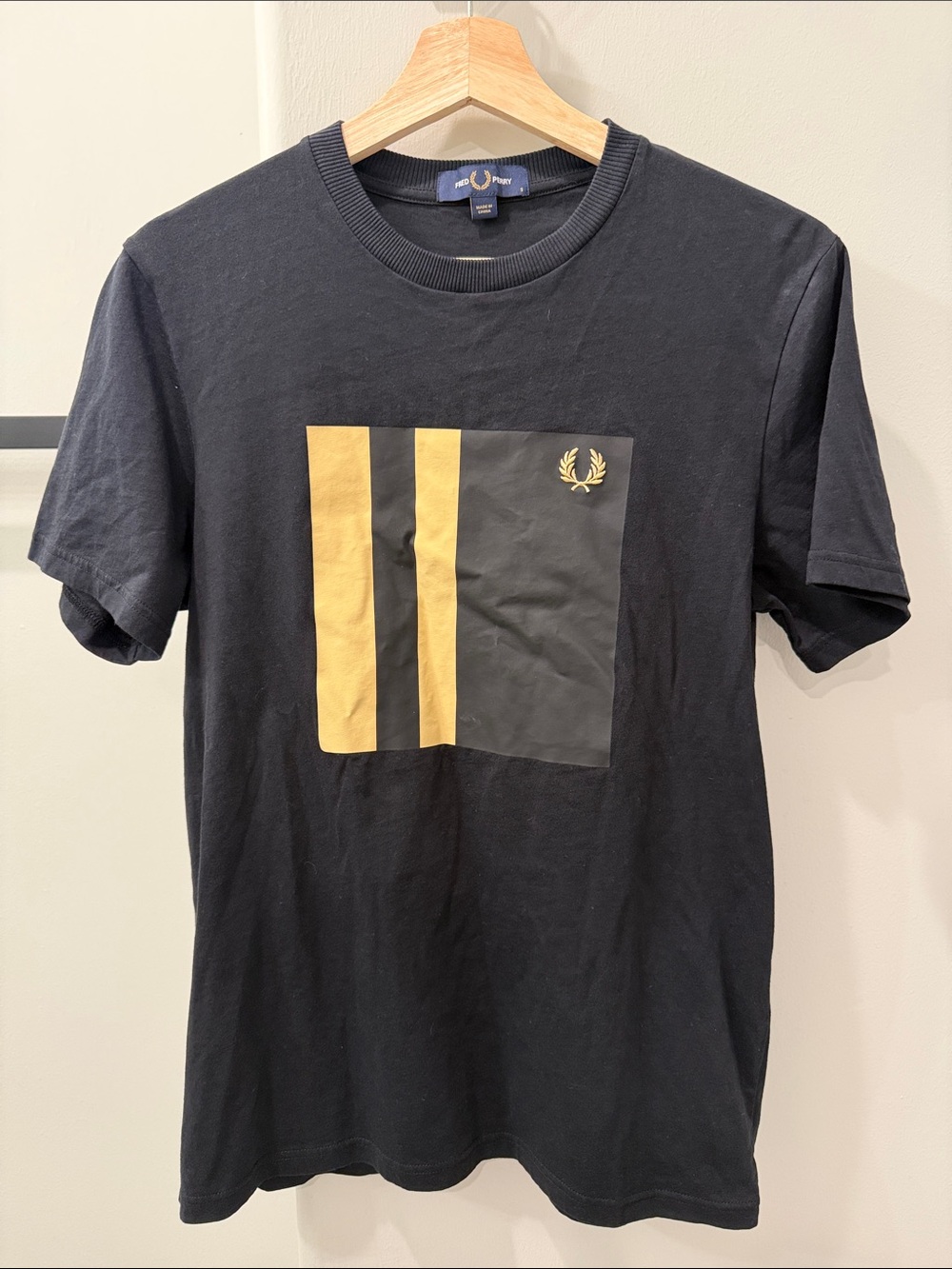 Fred Perry Black Short-Sleeve Tee with Gold Panel Stripes